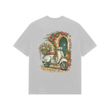 Courtyard Blooms — Premium Oversized T-shirt in Light Grey — model