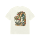 Courtyard Blooms — Premium Oversized T-shirt in Ivory — model